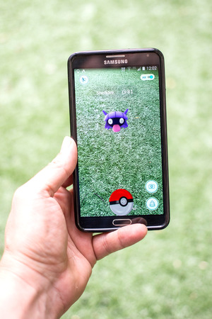 AUG 03, 2016 MOSCOW, RUSSIA: Pokemon Go gameplay screenshot on the phone. Shellder pokemon on mobile...