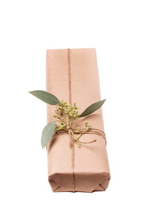 Parcels gift box with kraft paper, isolated imageの写真素材
