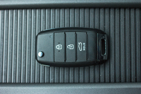 Modern Car remote control key in vehicle interior
