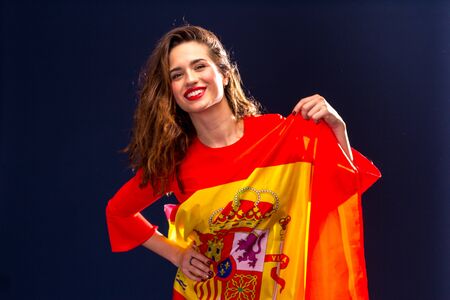 Beautiful woman with Flag of Spain.の写真素材