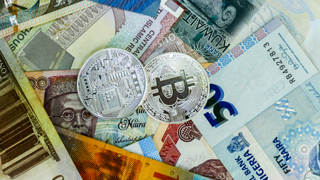 Bitcoin on banknote collage background. Electronic money exchange concept.の写真素材