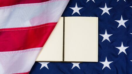 Leather cowered note on Red blue Flag of Unired States.の写真素材