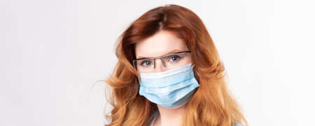 Middle age woman wearing virus protection maskの写真素材