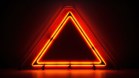 Red automotive safety triangle in perspective glowing on a dark background.の素材