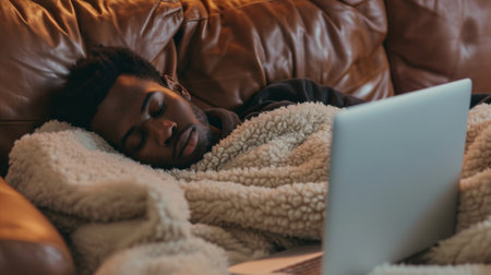 Overworked tired, businessman sleeping while using computer working late at night at home.