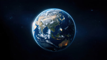 Stunning view of Earth captured from space, showing continents, oceans, and weather patterns. The image displays Asia and surrounding waters in bright daylight.の素材