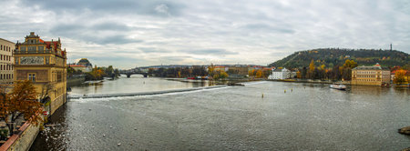 Autumn panorama of Prague with the Vltava river and historical architecture.の写真素材