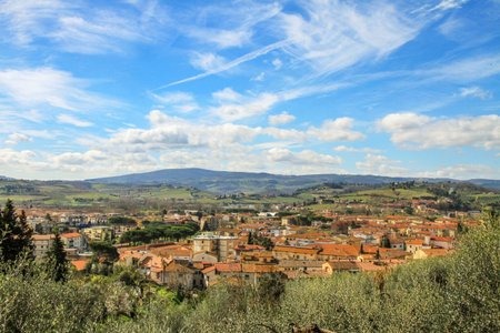 Certaldo, Tuscany, Italy, panoramic view of the medieval town with terracotta roofs and hills in the background.の写真素材