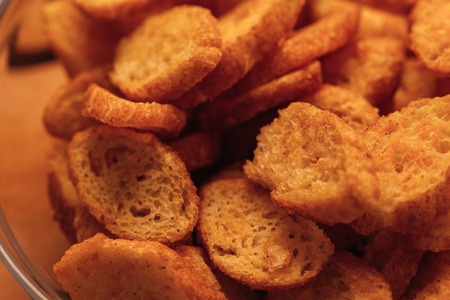 crisp fresh rusk bowl on a wooden background.の写真素材