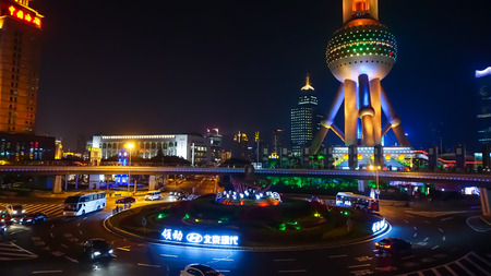 Shanghai, China - November 11, 2016: Shanghai skyscrapers in the evening and walking streetのeditorial素材