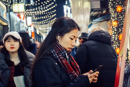 Seoul, South Korea - December 15, 2018: The night streets of Seoul never sleep. In the evening,...