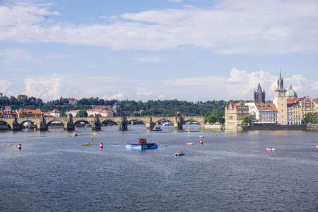 Prague, Czech Republic - July 28, 2018: Tourists ride catamarans on the Vltava Riverのeditorial素材