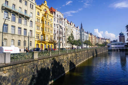Prague, Czech Republic - July 28, 2018: Beautiful water canal, architecture and many tourists walking around the city.のeditorial素材
