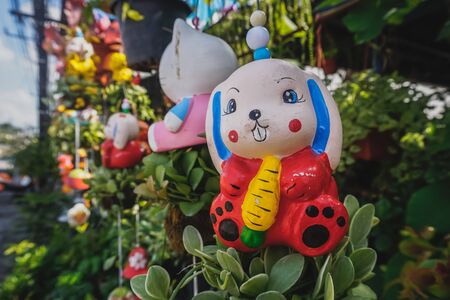 Children's toys on tropical plantsの写真素材