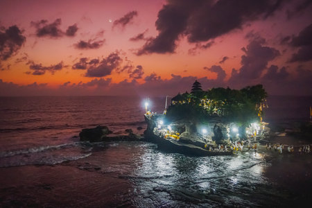 Beautiful sunset near Pura Tanah Lot in Baliの写真素材