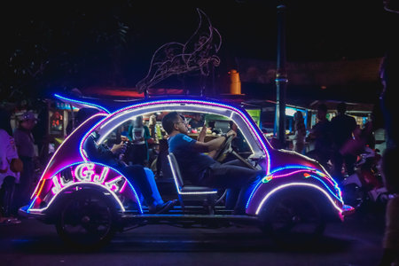 Yogyakarta, Indonesia - December 31, 2018: People ride neon carsのeditorial素材