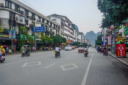 Yangshuo, China - May 18, 2019: Daily life in the mountain city of Yangshuoのeditorial素材