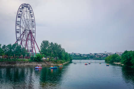 Irkutsk, Russia - June 23, 2019: People ride on catamarans in the central parkのeditorial素材