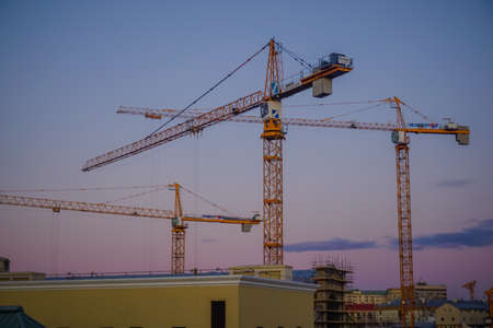 Moscow, Russia - August 28, 2019: Several tower cranes in the cityのeditorial素材