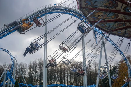Saint Petersburg, Russia - October 21, 2019: Children ride a carousel in the parkのeditorial素材