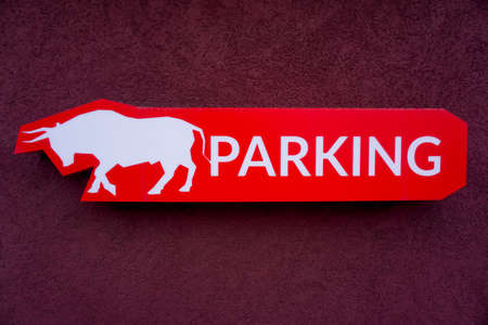 Voronezh, Russia - March 16, 2020: Parking symbol and white bull on a red backgroundのeditorial素材