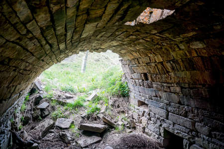 Ancient arch grotto in the mountains of Dagestanの写真素材