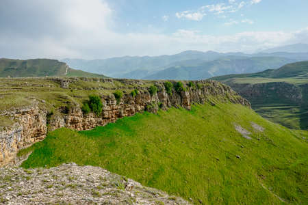 Picturesque green valley and mountains in Dagestan republic in Russiaの写真素材
