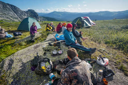 Ergaki, Krasnoyarsk Territory, Russia - July 16, 2020: Hikers rest in the mountainsのeditorial素材