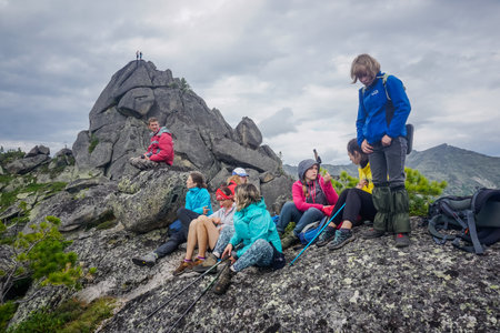 Ergaki, Krasnoyarsk Territory, Russia - July 17, 2020: Hikers rest in the mountainsのeditorial素材