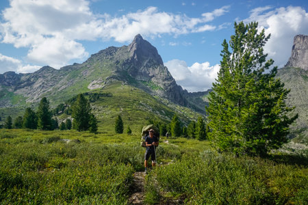 Ergaki, Krasnoyarsk Territory, Russia - July 23, 2020: Hikers in the Sayan Mountainsのeditorial素材