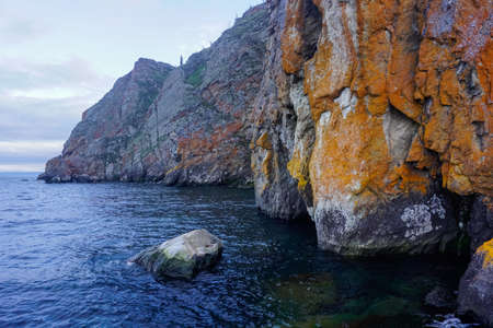 Rocky coast of Olkhon island at Baikal lake in Siberia