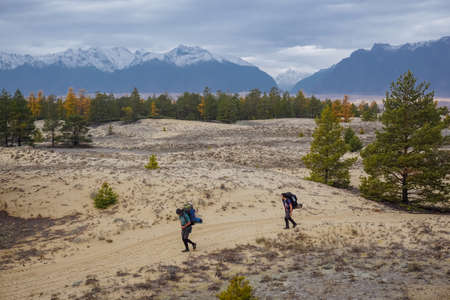 Chara, Trans-Baikal Territory, Russia - September 23, 2020: Travelers in the northernmost desert of...
