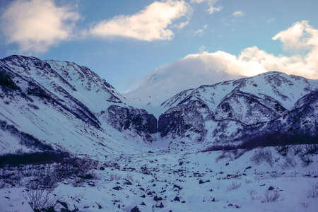 Frozen Vilyuchinsky waterfall in winter in Kamchatka peninsula in Russiaの写真素材