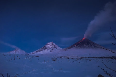 Volcano Klyuchevskaya Sopka erupting at night in Kamchatkaの写真素材
