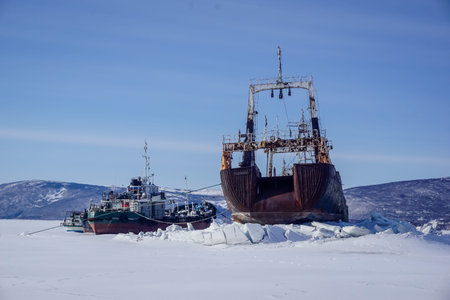 An abandoned ship in a frozen bay