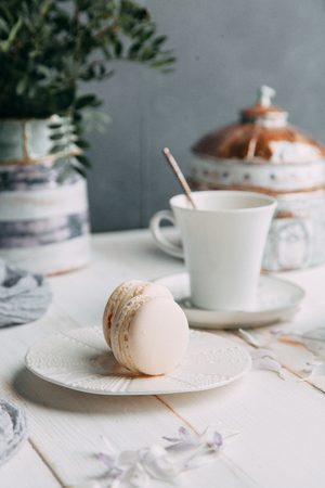 coffee and marshmallows on wooden background composition with flowersの写真素材