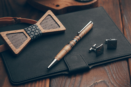 expensive pens business class for entrepreneurs, on wooden backgroundの写真素材