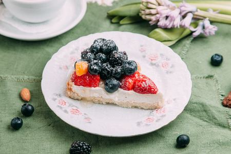 desserts on wood background for restaurant menu, with berries and ice creamの写真素材