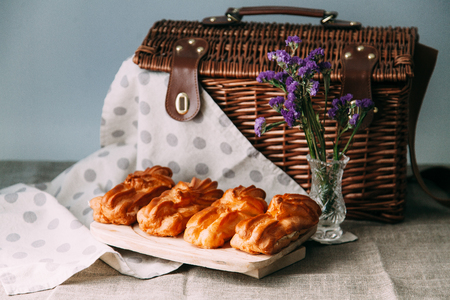 homemade pastries with fillings of potatoes, cabbage and fish, in the composition on a textured...