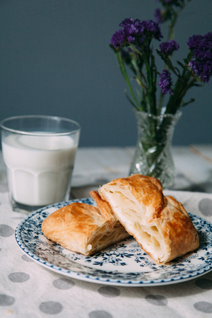 homemade pastries with fillings of potatoes, cabbage and fish, in the composition on a textured backgroundの写真素材