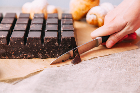 homemade pastries with fillings of potatoes, cabbage and fish, in the composition on a textured backgroundの写真素材