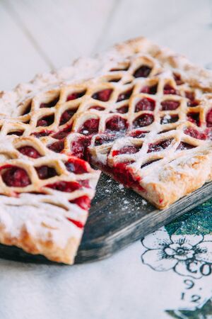 homemade pastries with fillings of potatoes, cabbage and fish, in the composition on a textured backgroundの写真素材