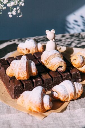 homemade pastries with fillings of potatoes, cabbage and fish, in the composition on a textured backgroundの写真素材