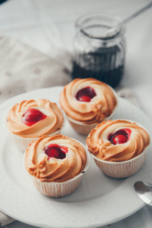 cooking cakes with powdered sugar chocolate on a textured backgroundの写真素材