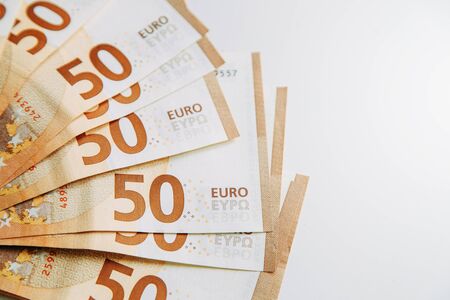 Layout of money on a white background Flatley. Paper money account in Europe. 50 Euro banknotes. の写真素材