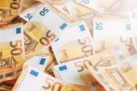Layout of money on a white background Flatley. Paper money account in Europe. 50 Euro banknotes.の写真素材