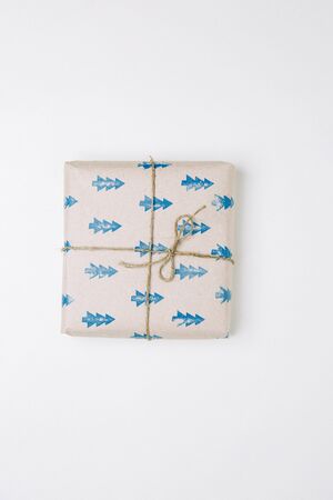 Set of boxes on white background. Gifts in Kraft packaging with ribbon.の写真素材