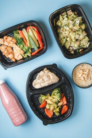 Diet meals for vegans. Set of food for delivery on a bright background.の写真素材