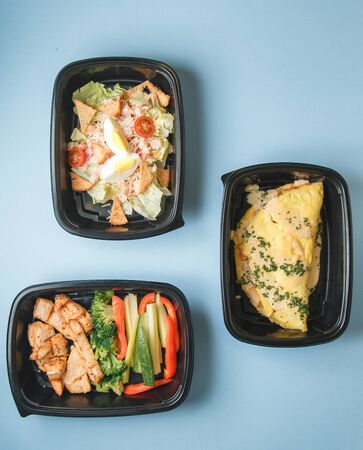 Diet meals for vegans. Set of food for delivery on a bright background.の写真素材