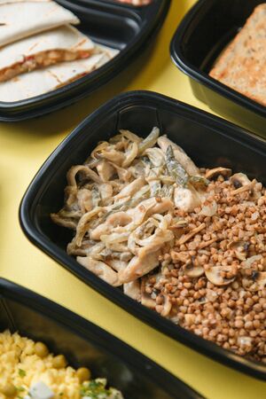 Diet meals for vegans. Set of food for delivery on a bright background.